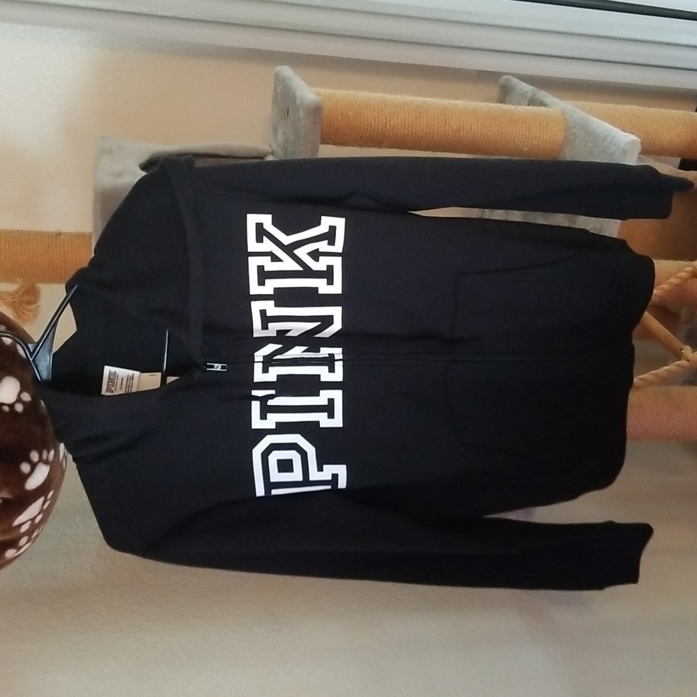 Pink zip up hoodie. Black. Size medium